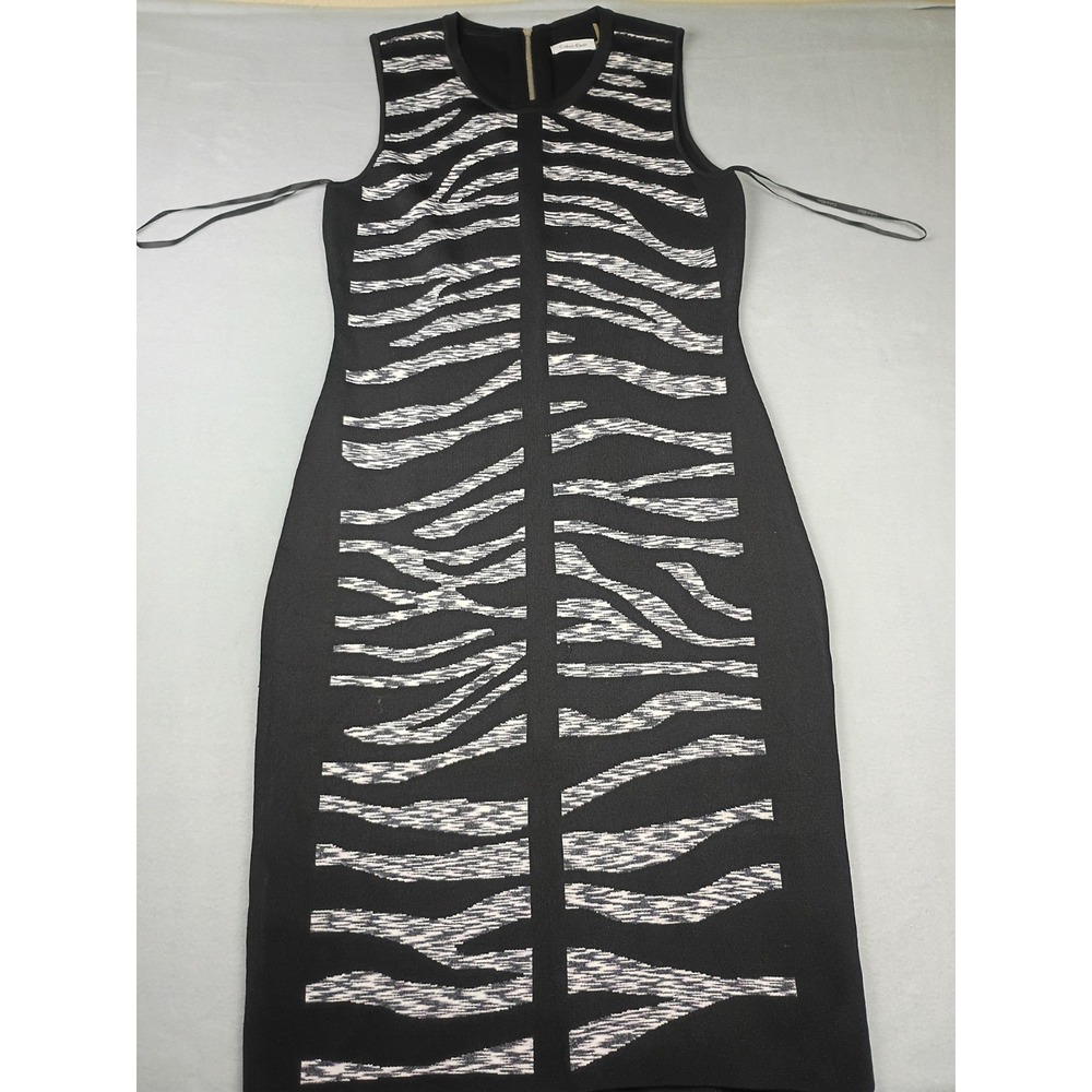 Calvin Klein black knit dress featuring a textured zebra-stripe pattern